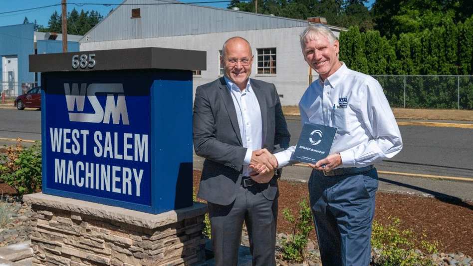 Peter Jonsson, CEO of Bruks Siwertell Group, and Mark Lyman, CEO of West Salem Machinery (WSM), at the WSM facility in Salem, Oregon, on June 30.